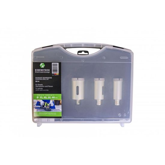 Clear plastic case holding three white cylindrical electrical fuses and a green/black product label on the left side
