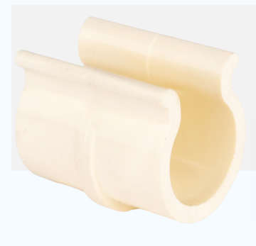 White plastic pipe clamp with a semicircular groove, used to secure a cylindrical pipe or tubing.